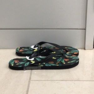 Old navy never worn green, black, and yellow flip flops